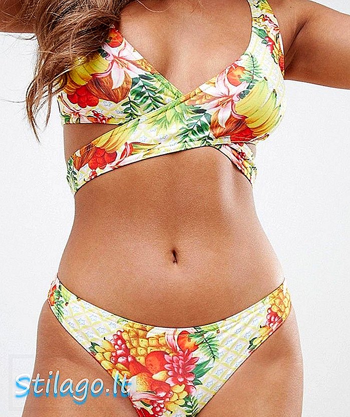 ASOS DESIGN - Bikini a vita bassa in nylon riciclato con stampa di frutti tropicali - Multi