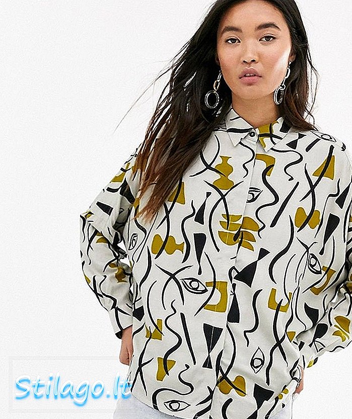 Monki boxy blouse met abstract gezicht print in lichtbeige