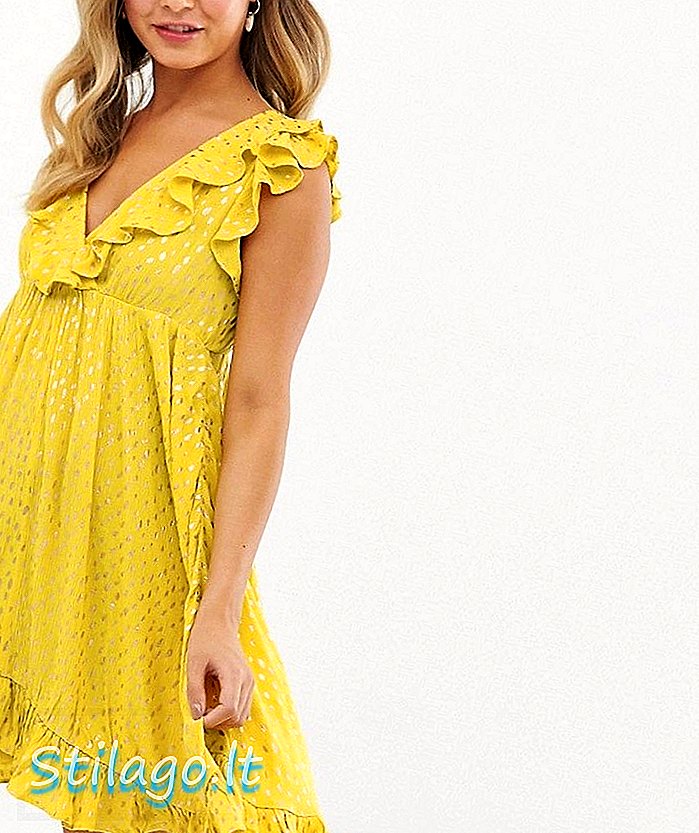 Гламурне плаття на задній фігурній фігурі із криво-жовтим