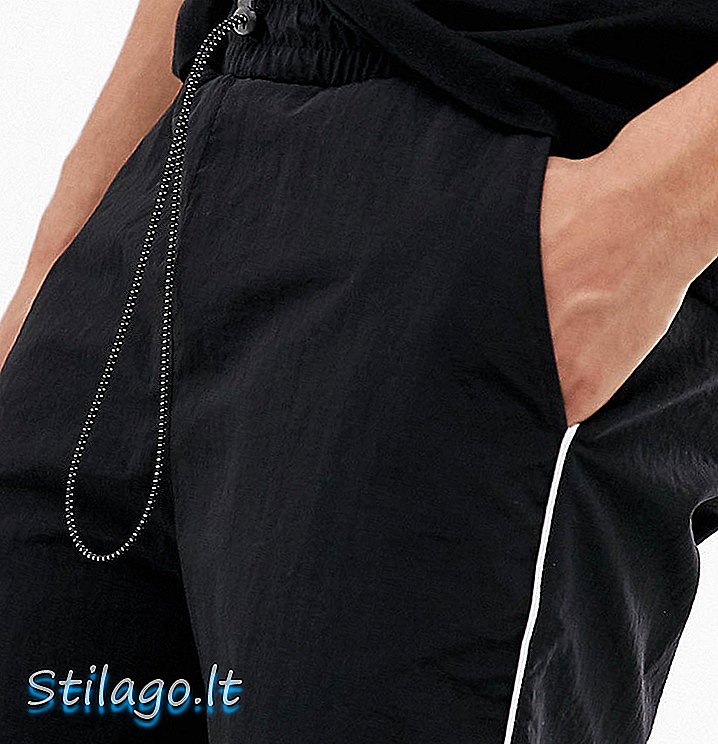 COLLUSION nylon shorts med rør-sort