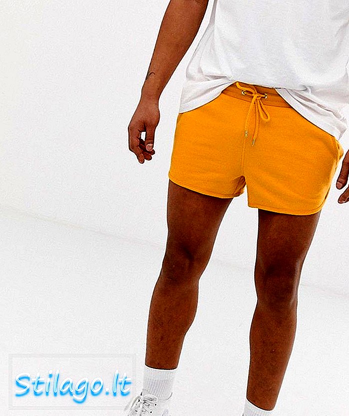 Kratke hlače iz dresa ASOS DESIGN v rumeni barvi