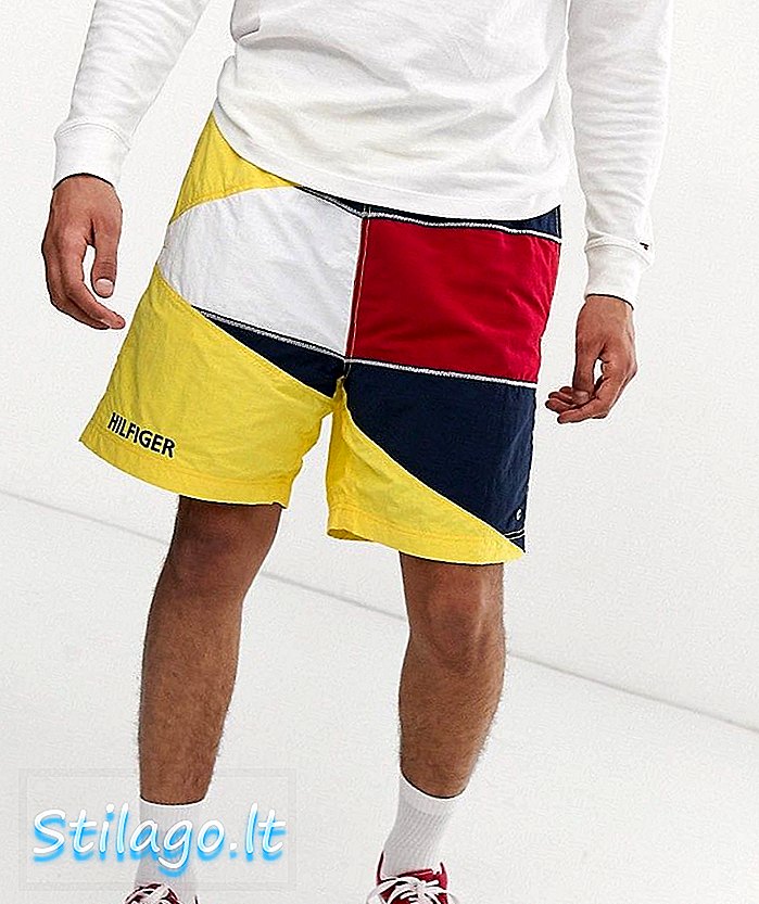 Seluar pendek Kapsul Tommy Jeans Summer Heritage berwarna kuning dengan logo bendera besar
