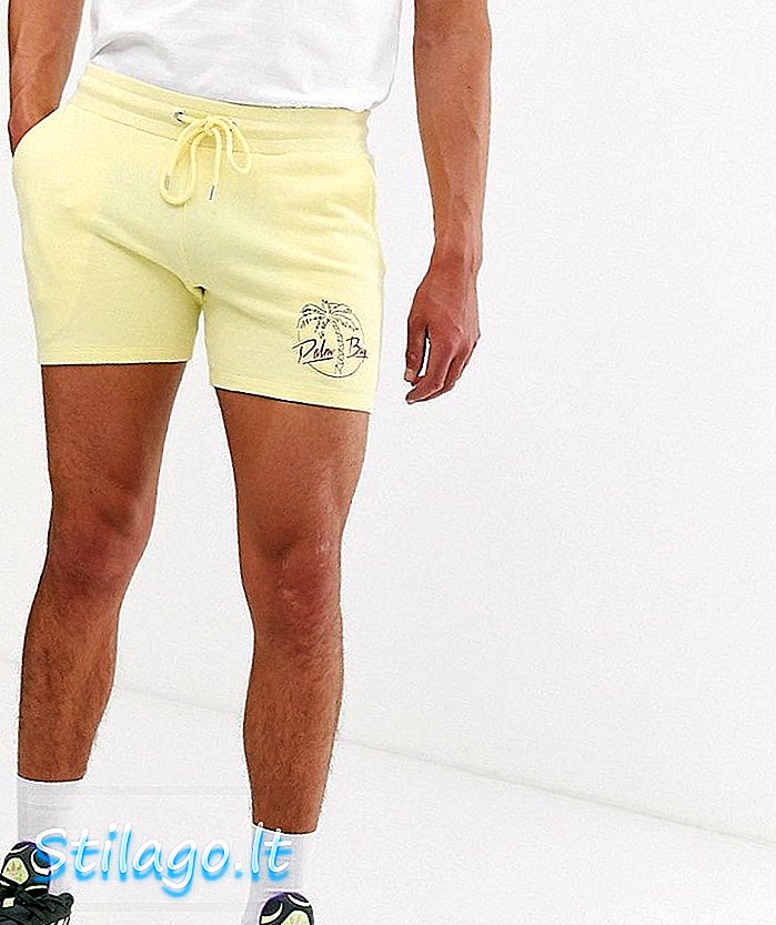 ASOS DESIGN กางเกงขาสั้นสกินนีขายาวสีเงินพิมพ์ลายปาล์มสีเหลือง