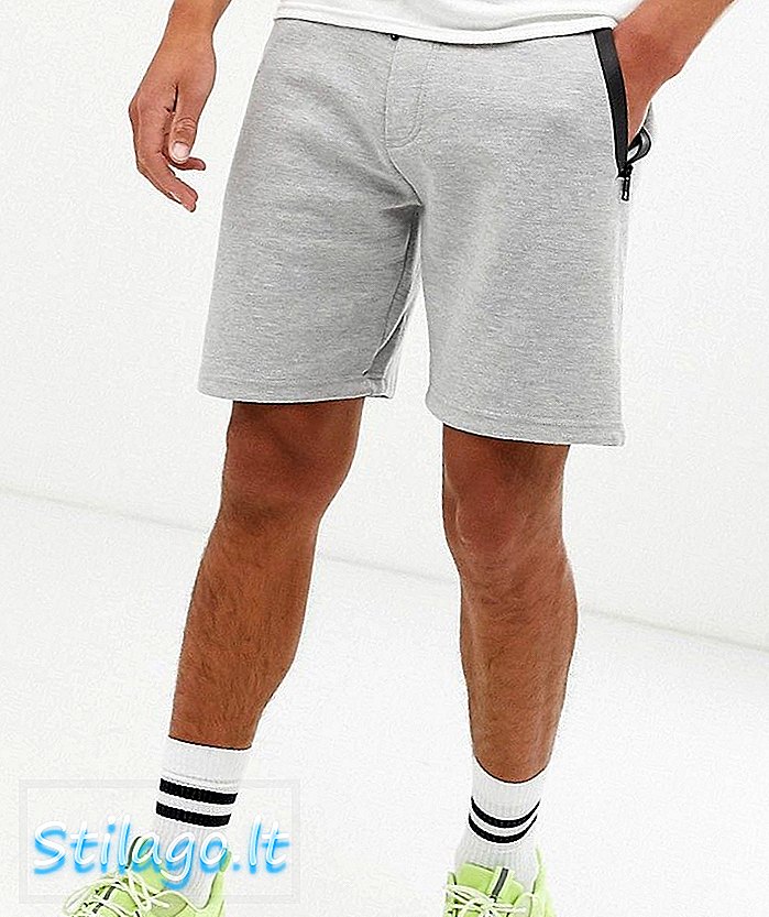 Pantaloncini da jogging Bershka con dettaglio tasca in grigio chiaro