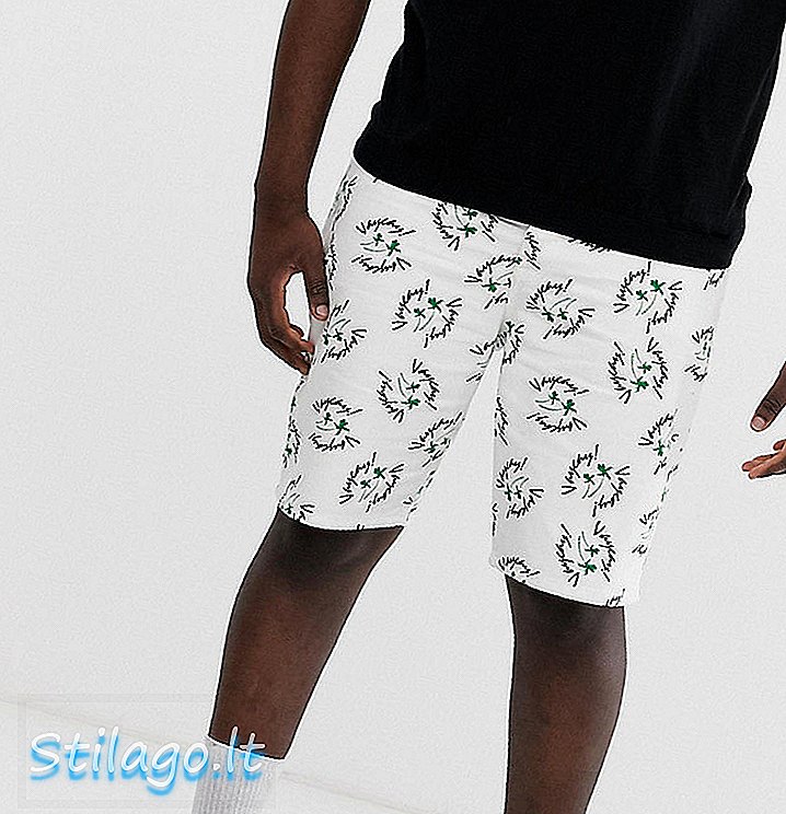 ASOS DESIGN Plus - Shorts slim in denim con stampa bianca per le vacanze