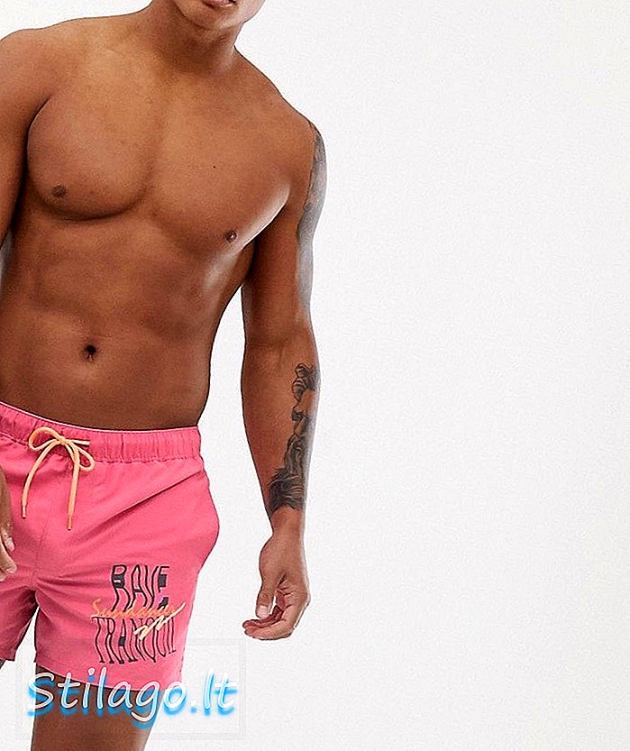 ASOS DESIGN pantaloni scurți de înot în roz spălat, cu plasarea textului pe lungime scurtă