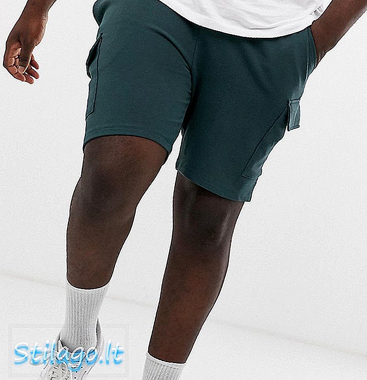 ASOS DESIGN Plus skinny shorts med jersey med lastfickor i grönt