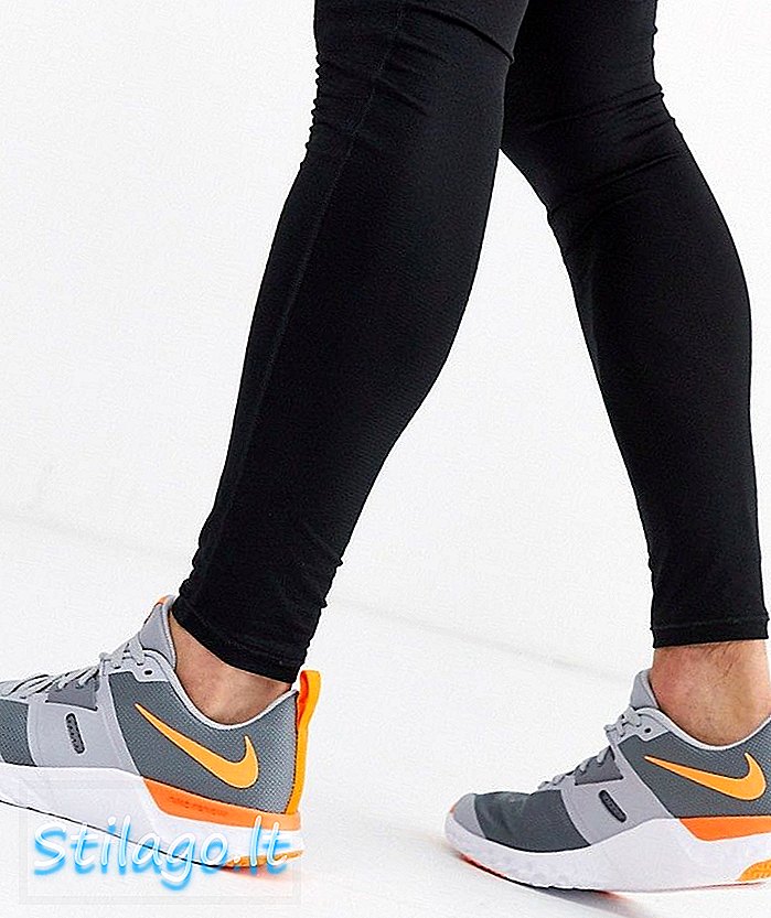 Nike Training Renew Retaliation Trainer ในสีเทาและส้ม